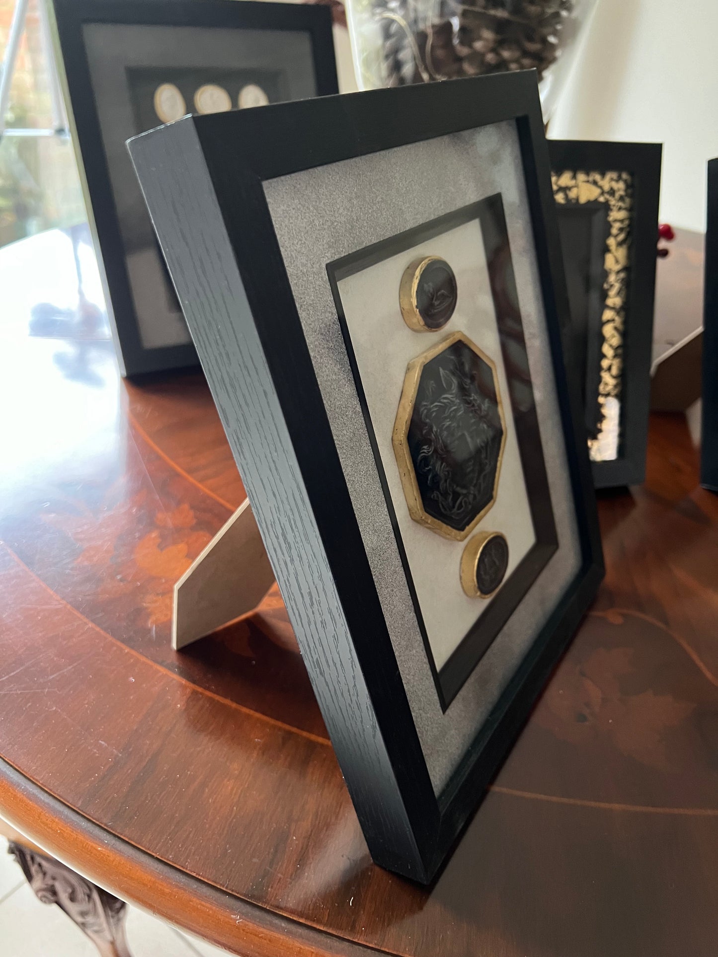 Set of Three Black Intaglio's In Black Frame