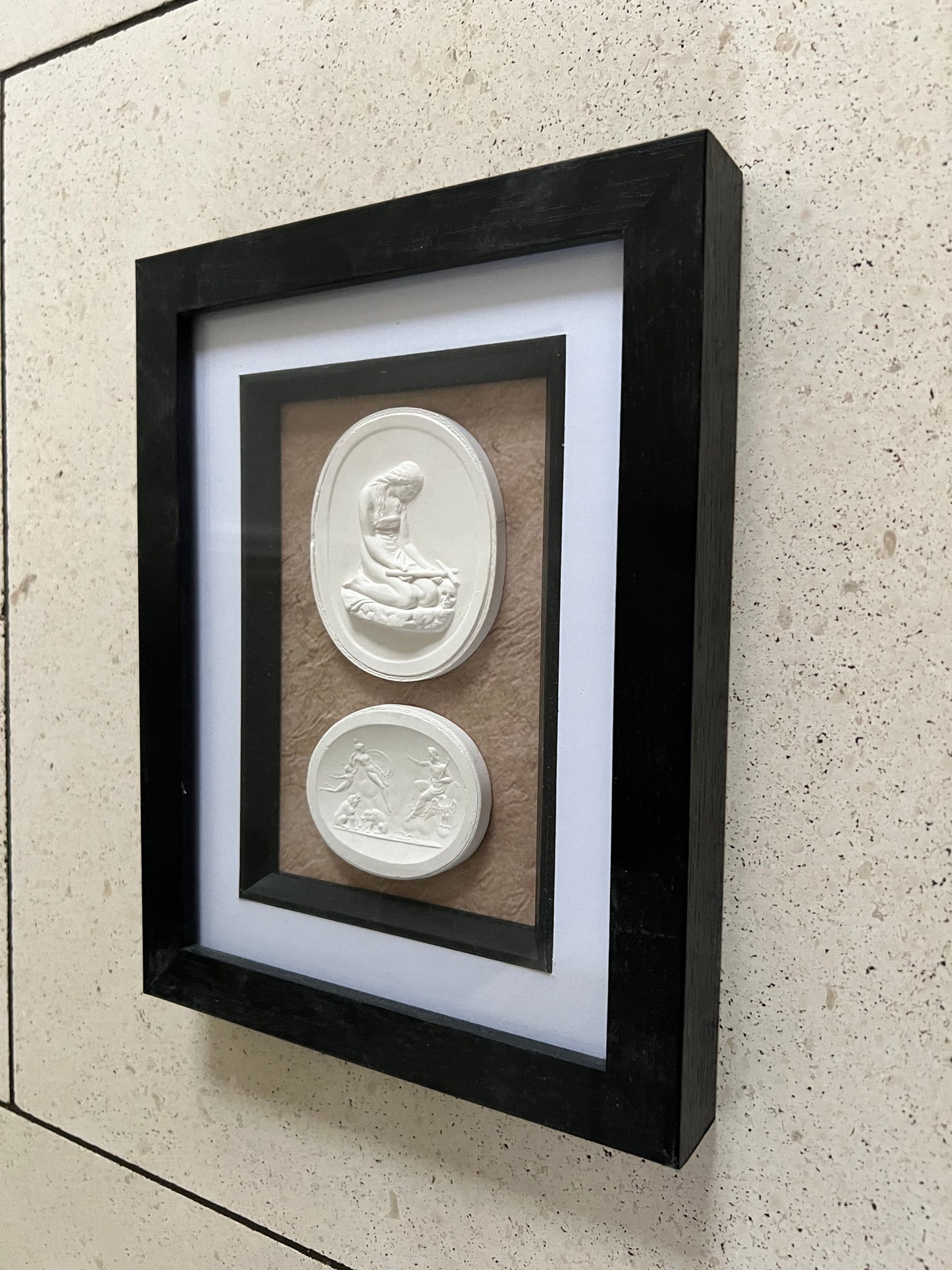 A Pair Of Framed Intaglio's