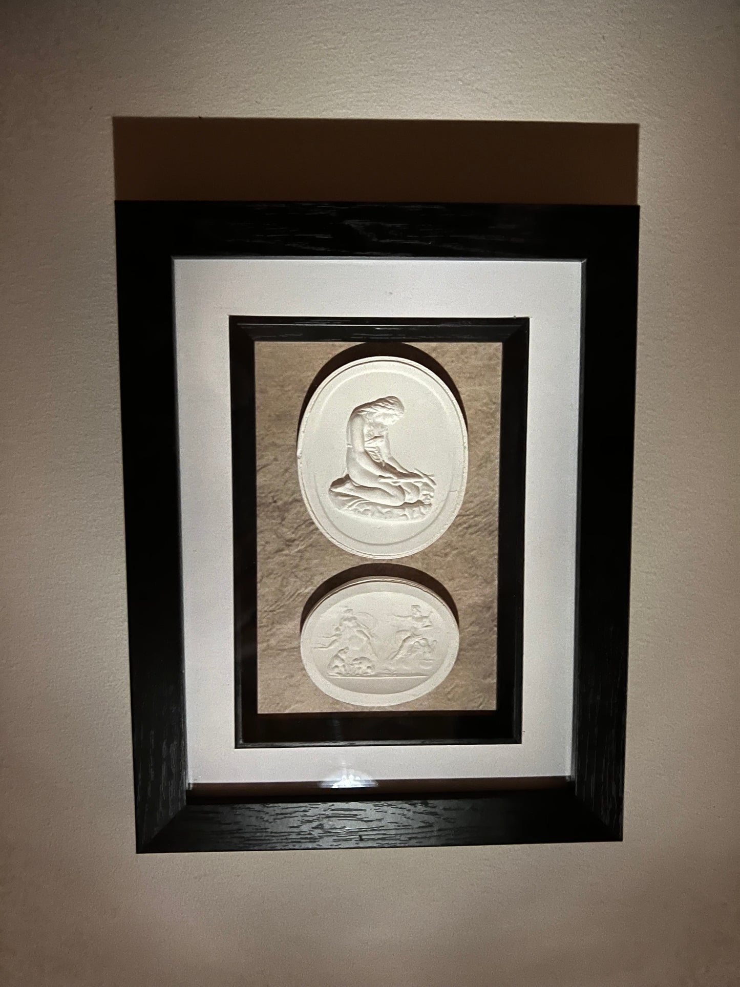 A Pair Of Framed Intaglio's