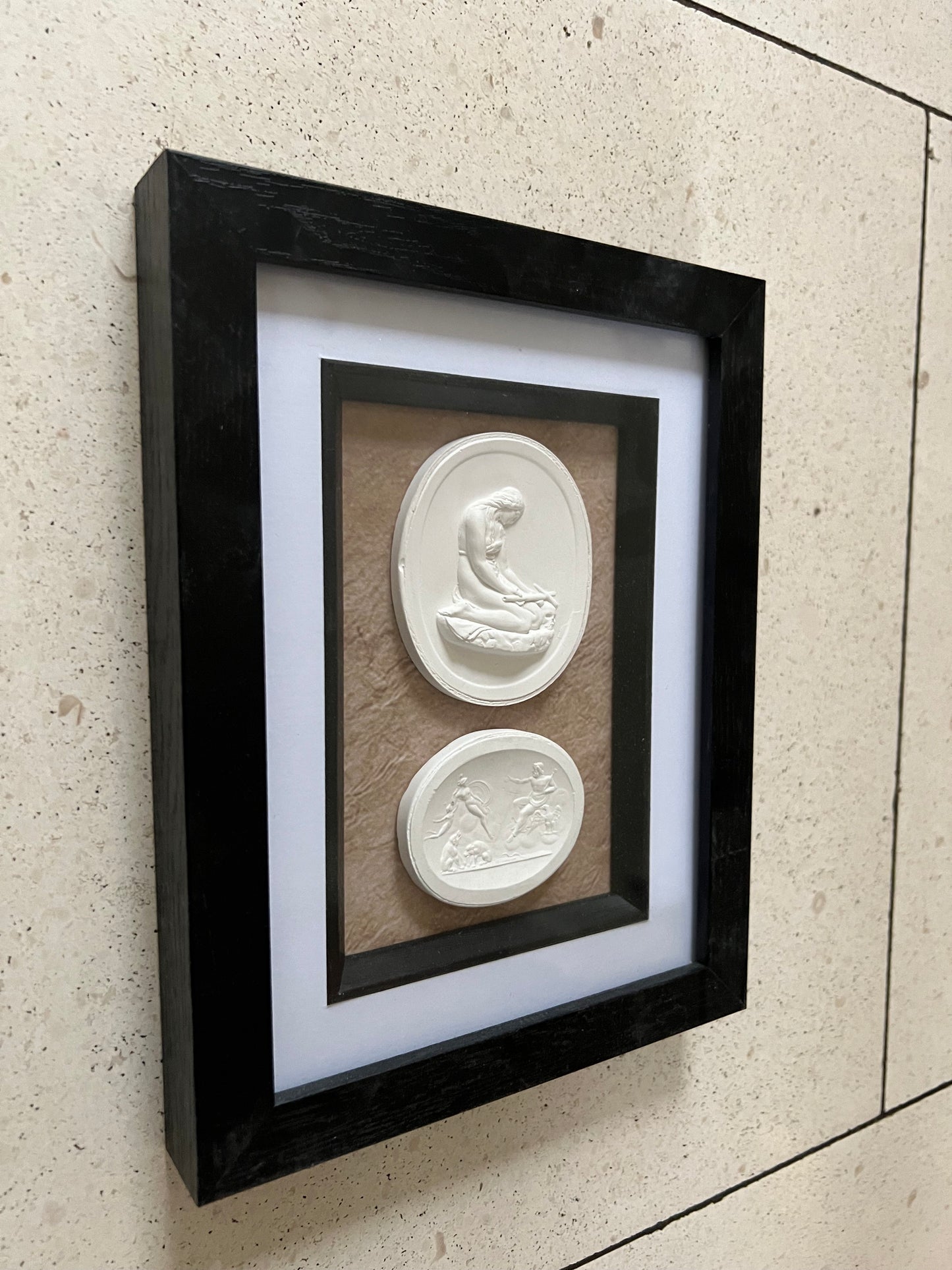 A Pair Of Framed Intaglio's