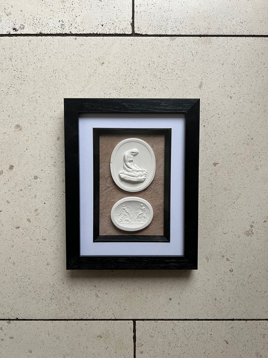 A Pair Of Framed Intaglio's